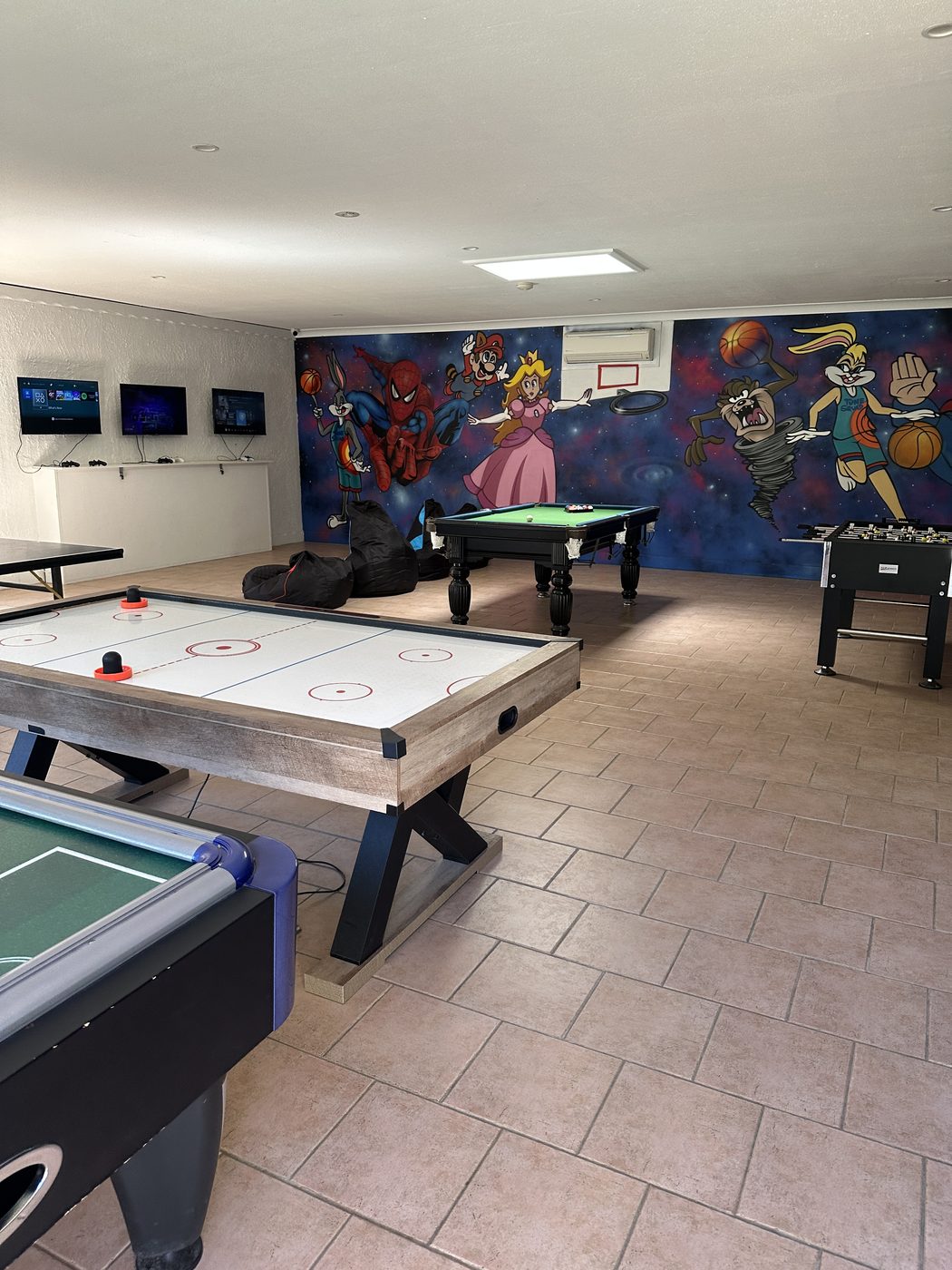 Games room with pool tables and table tennis at Korora Bay Village Resort, Coffs Harbour