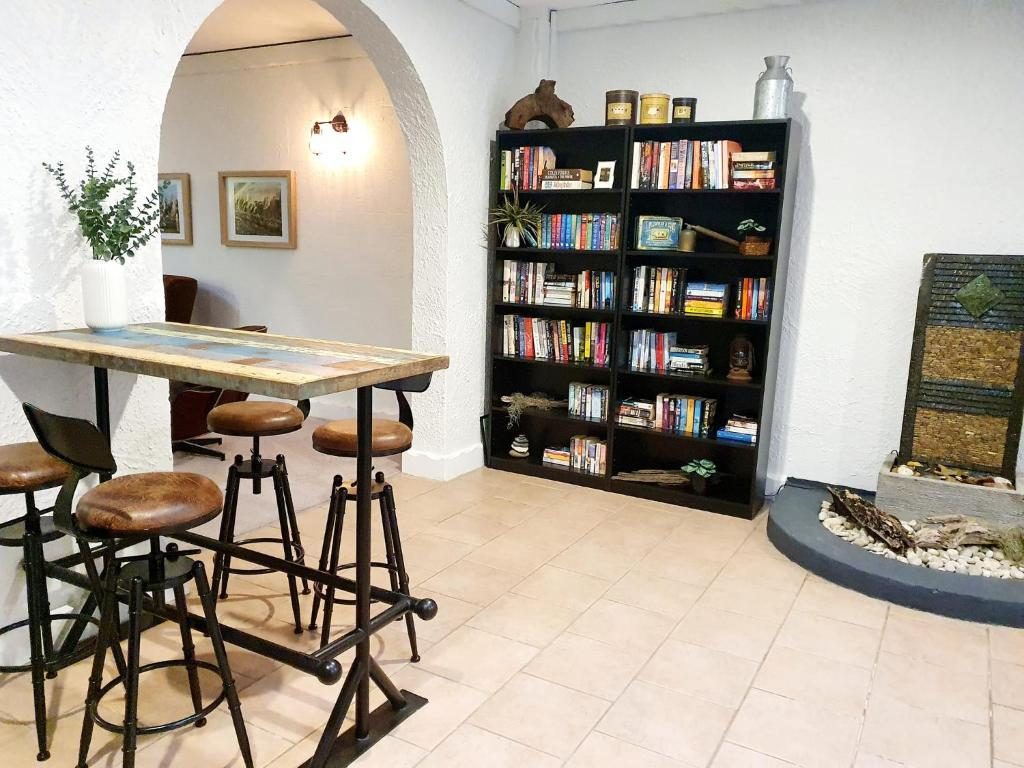 Resort library and board games at Korora Bay Village Resort