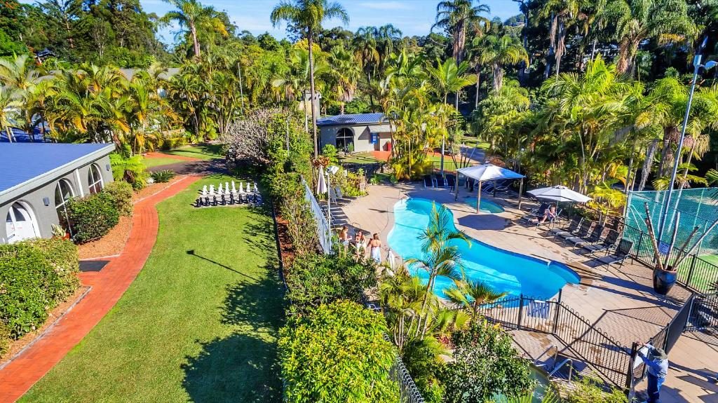 Solar-heated resort pool and sub-tropical gardens at Korora Bay Village Resort, Coffs Harbour NSW